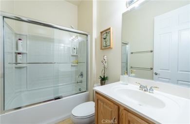 Charming 2-bedroom, 2-bathroom home with a versatile den/office on  in California - for sale on GolfHomes.com, golf home, golf lot