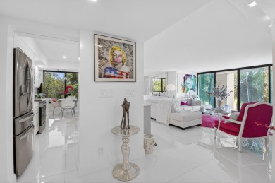 Discover luxury living in this beautifully renovated condo at on Boca West Golf and Country Club in Florida - for sale on GolfHomes.com, golf home, golf lot
