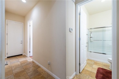 Charming 2-bedroom, 2-bathroom home with a versatile den/office on  in California - for sale on GolfHomes.com, golf home, golf lot