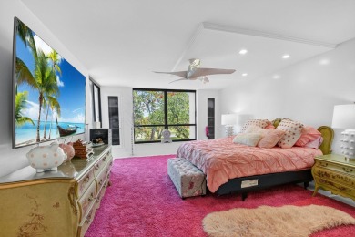 Discover luxury living in this beautifully renovated condo at on Boca West Golf and Country Club in Florida - for sale on GolfHomes.com, golf home, golf lot
