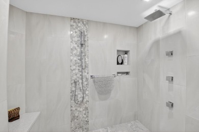 Discover luxury living in this beautifully renovated condo at on Boca West Golf and Country Club in Florida - for sale on GolfHomes.com, golf home, golf lot