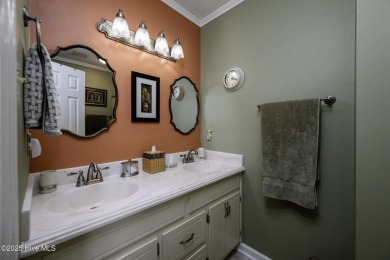 Perfectly situated in the waterfront community of Fairfield on Harbour Point Golf Club in North Carolina - for sale on GolfHomes.com, golf home, golf lot