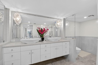 Discover luxury living in this beautifully renovated condo at on Boca West Golf and Country Club in Florida - for sale on GolfHomes.com, golf home, golf lot