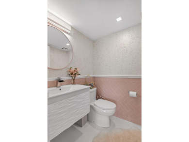 Discover luxury living in this beautifully renovated condo at on Boca West Golf and Country Club in Florida - for sale on GolfHomes.com, golf home, golf lot