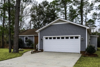 Perfectly situated in the waterfront community of Fairfield on Harbour Point Golf Club in North Carolina - for sale on GolfHomes.com, golf home, golf lot