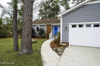 Perfectly situated in the waterfront community of Fairfield on Harbour Point Golf Club in North Carolina - for sale on GolfHomes.com, golf home, golf lot