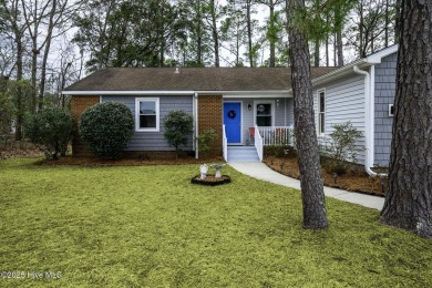 Perfectly situated in the waterfront community of Fairfield on Harbour Point Golf Club in North Carolina - for sale on GolfHomes.com, golf home, golf lot