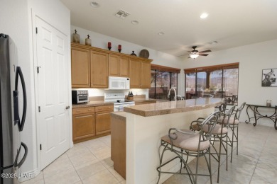 Discover resort style living in this spacious 3-bedroom on The Refuge Golf and Country Club in Arizona - for sale on GolfHomes.com, golf home, golf lot