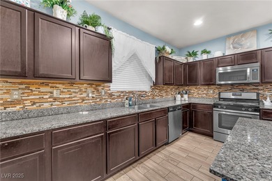 Live inside one of Henderson's most highly desirable guard-gated on Tuscany Golf Club in Nevada - for sale on GolfHomes.com, golf home, golf lot