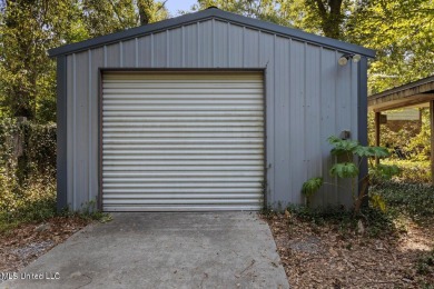 Built by Carroll Ishee in 1960 this home retains it's cork on Gulf Hills Golf Club in Mississippi - for sale on GolfHomes.com, golf home, golf lot