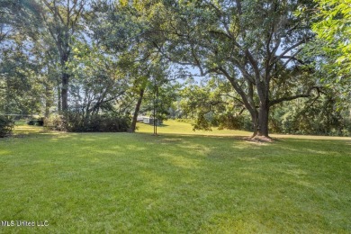 Built by Carroll Ishee in 1960 this home retains it's cork on Gulf Hills Golf Club in Mississippi - for sale on GolfHomes.com, golf home, golf lot