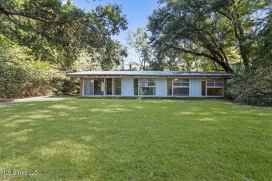 Built by Carroll Ishee in 1960 this home retains it's cork on Gulf Hills Golf Club in Mississippi - for sale on GolfHomes.com, golf home, golf lot