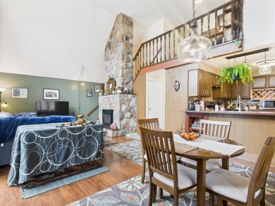 Welcome to this delightful 3-bedroom, 2-bath chalet packed with on Michaywe Pines Course in Michigan - for sale on GolfHomes.com, golf home, golf lot