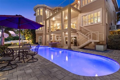Welcome to a stunning custom waterfront home in the prestigious on Pasadena Yacht and Country Club in Florida - for sale on GolfHomes.com, golf home, golf lot