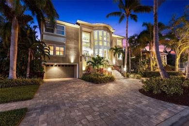 Welcome to a stunning custom waterfront home in the prestigious on Pasadena Yacht and Country Club in Florida - for sale on GolfHomes.com, golf home, golf lot