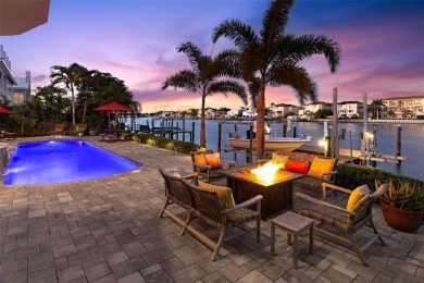 Welcome to a stunning custom waterfront home in the prestigious on Pasadena Yacht and Country Club in Florida - for sale on GolfHomes.com, golf home, golf lot