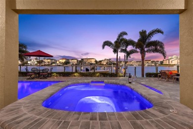 Welcome to a stunning custom waterfront home in the prestigious on Pasadena Yacht and Country Club in Florida - for sale on GolfHomes.com, golf home, golf lot