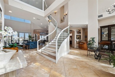 Welcome to a stunning custom waterfront home in the prestigious on Pasadena Yacht and Country Club in Florida - for sale on GolfHomes.com, golf home, golf lot