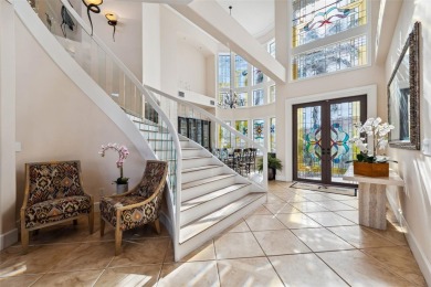 Welcome to a stunning custom waterfront home in the prestigious on Pasadena Yacht and Country Club in Florida - for sale on GolfHomes.com, golf home, golf lot