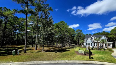 Tucked at the end of a peaceful cul-de-sac, this spacious on Ocean Ridge Plantation in North Carolina - for sale on GolfHomes.com, golf home, golf lot