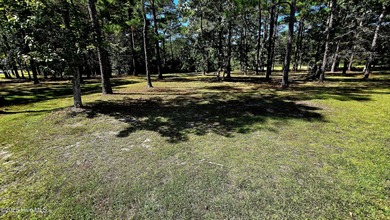 Tucked at the end of a peaceful cul-de-sac, this spacious on Ocean Ridge Plantation in North Carolina - for sale on GolfHomes.com, golf home, golf lot