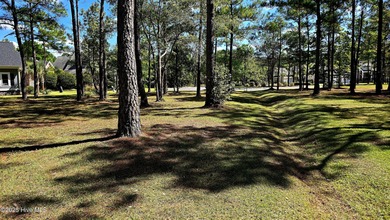 Tucked at the end of a peaceful cul-de-sac, this spacious on Ocean Ridge Plantation in North Carolina - for sale on GolfHomes.com, golf home, golf lot