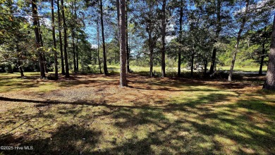 Tucked at the end of a peaceful cul-de-sac, this spacious on Ocean Ridge Plantation in North Carolina - for sale on GolfHomes.com, golf home, golf lot