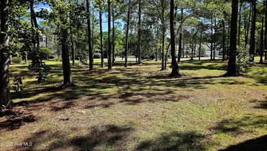 Tucked at the end of a peaceful cul-de-sac, this spacious on Ocean Ridge Plantation in North Carolina - for sale on GolfHomes.com, golf home, golf lot