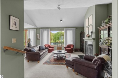 Beautiful 3-bedroom, 2.5-bath ranch home located on the 14th on Grand Traverse Resort and Spa in Michigan - for sale on GolfHomes.com, golf home, golf lot