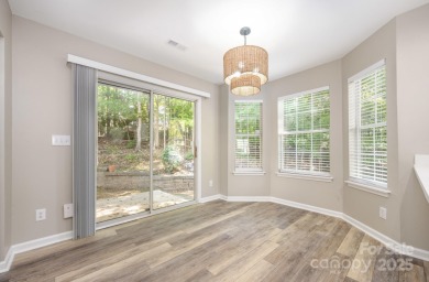 ONE LEVEL, END UNIT Move-in Ready: Newly painted throughout and on Raintree Country Club in North Carolina - for sale on GolfHomes.com, golf home, golf lot