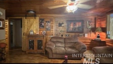 Motivated Seller! Log cabin with many improvements through the on Terrace Lakes Golf Resort in Idaho - for sale on GolfHomes.com, golf home, golf lot