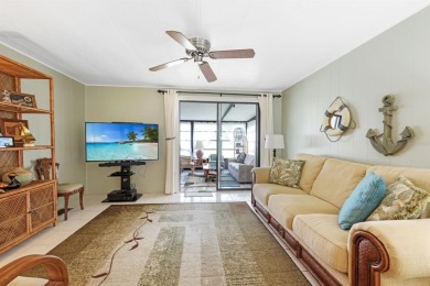 Sassy and charming 2 bedroom, 2 full bath home in award-winning on Maple Leaf Golf and Country Club in Florida - for sale on GolfHomes.com, golf home, golf lot