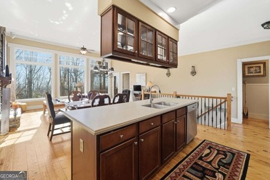 At 2,600-foot elevation, this stunning Craftsman-style retreat on Big Canoe Golf Club - Cherokee in Georgia - for sale on GolfHomes.com, golf home, golf lot