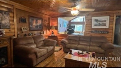 Motivated Seller! Log cabin with many improvements through the on Terrace Lakes Golf Resort in Idaho - for sale on GolfHomes.com, golf home, golf lot