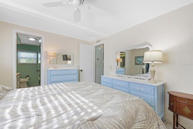 Sassy and charming 2 bedroom, 2 full bath home in award-winning on Maple Leaf Golf and Country Club in Florida - for sale on GolfHomes.com, golf home, golf lot
