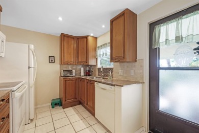 Sassy and charming 2 bedroom, 2 full bath home in award-winning on Maple Leaf Golf and Country Club in Florida - for sale on GolfHomes.com, golf home, golf lot