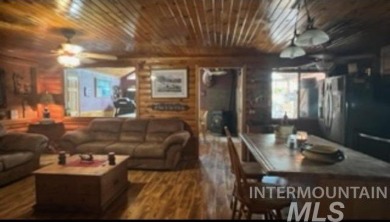 Motivated Seller! Log cabin with many improvements through the on Terrace Lakes Golf Resort in Idaho - for sale on GolfHomes.com, golf home, golf lot