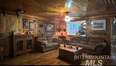 Motivated Seller! Log cabin with many improvements through the on Terrace Lakes Golf Resort in Idaho - for sale on GolfHomes.com, golf home, golf lot