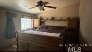 Motivated Seller! Log cabin with many improvements through the on Terrace Lakes Golf Resort in Idaho - for sale on GolfHomes.com, golf home, golf lot