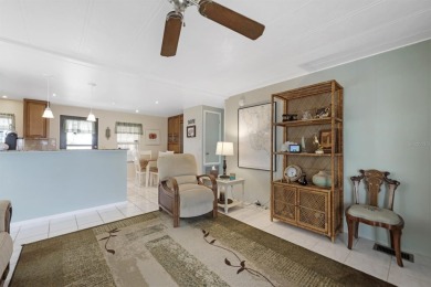 Sassy and charming 2 bedroom, 2 full bath home in award-winning on Maple Leaf Golf and Country Club in Florida - for sale on GolfHomes.com, golf home, golf lot