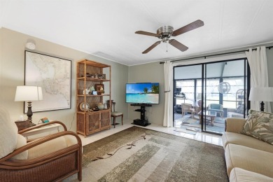Sassy and charming 2 bedroom, 2 full bath home in award-winning on Maple Leaf Golf and Country Club in Florida - for sale on GolfHomes.com, golf home, golf lot