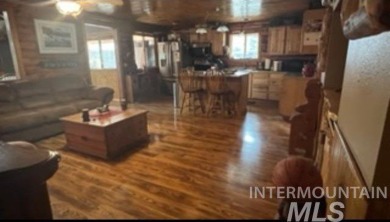 Motivated Seller! Log cabin with many improvements through the on Terrace Lakes Golf Resort in Idaho - for sale on GolfHomes.com, golf home, golf lot