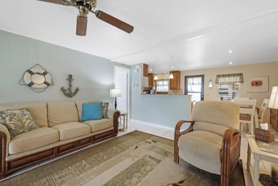 Sassy and charming 2 bedroom, 2 full bath home in award-winning on Maple Leaf Golf and Country Club in Florida - for sale on GolfHomes.com, golf home, golf lot