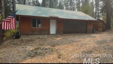 Motivated Seller! Log cabin with many improvements through the on Terrace Lakes Golf Resort in Idaho - for sale on GolfHomes.com, golf home, golf lot