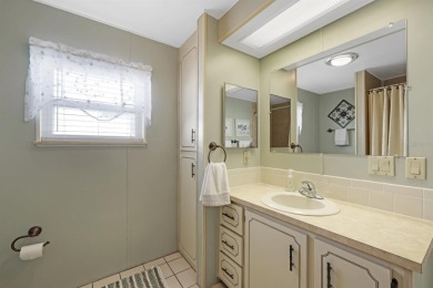 Sassy and charming 2 bedroom, 2 full bath home in award-winning on Maple Leaf Golf and Country Club in Florida - for sale on GolfHomes.com, golf home, golf lot