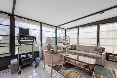 Sassy and charming 2 bedroom, 2 full bath home in award-winning on Maple Leaf Golf and Country Club in Florida - for sale on GolfHomes.com, golf home, golf lot