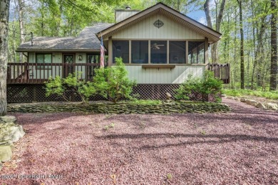 Discover the perfect blend of comfort and charm in this on Lake Naomi Timber Trails Golf Club in Pennsylvania - for sale on GolfHomes.com, golf home, golf lot