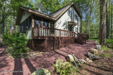 Discover the perfect blend of comfort and charm in this on Lake Naomi Timber Trails Golf Club in Pennsylvania - for sale on GolfHomes.com, golf home, golf lot