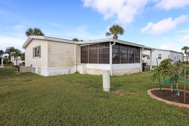 Sassy and charming 2 bedroom, 2 full bath home in award-winning on Maple Leaf Golf and Country Club in Florida - for sale on GolfHomes.com, golf home, golf lot