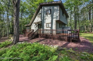 Discover the perfect blend of comfort and charm in this on Lake Naomi Timber Trails Golf Club in Pennsylvania - for sale on GolfHomes.com, golf home, golf lot